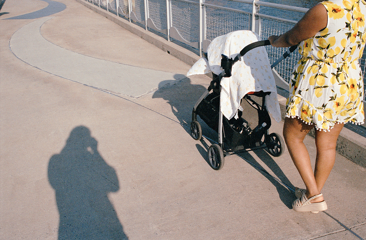 Shadow of a stroller on the ground